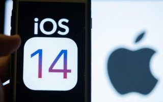 iOS 14 phone update in hand