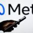 Meta logo behind person using their phone